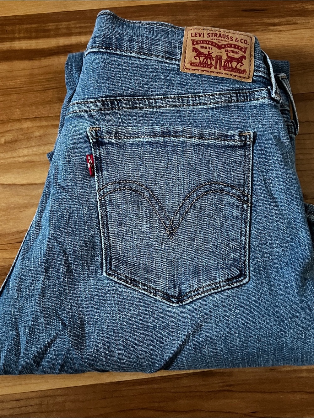 Levi's Light Blue Denim Jeans with Red Tab and Leather Patch